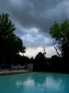 swimming pool and storm clouds